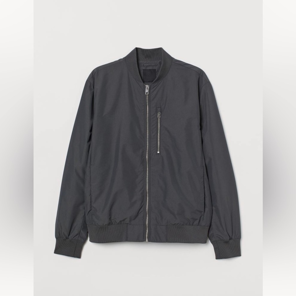 Bomber jacket Stand-up collar, zipper at front, and ribbing trims Size XS